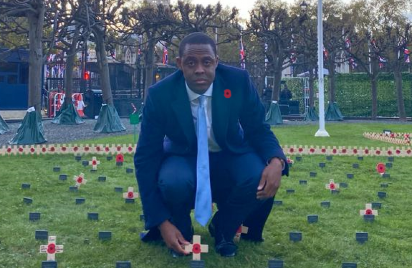 Bim placing the Remembrance Cross