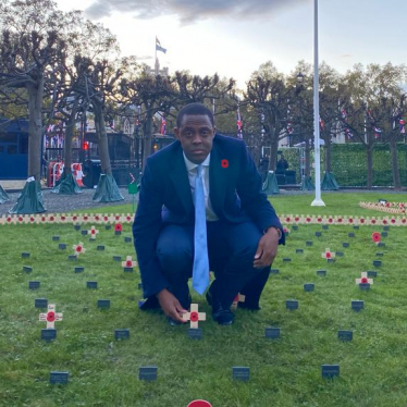 Bim placing the Remembrance Cross